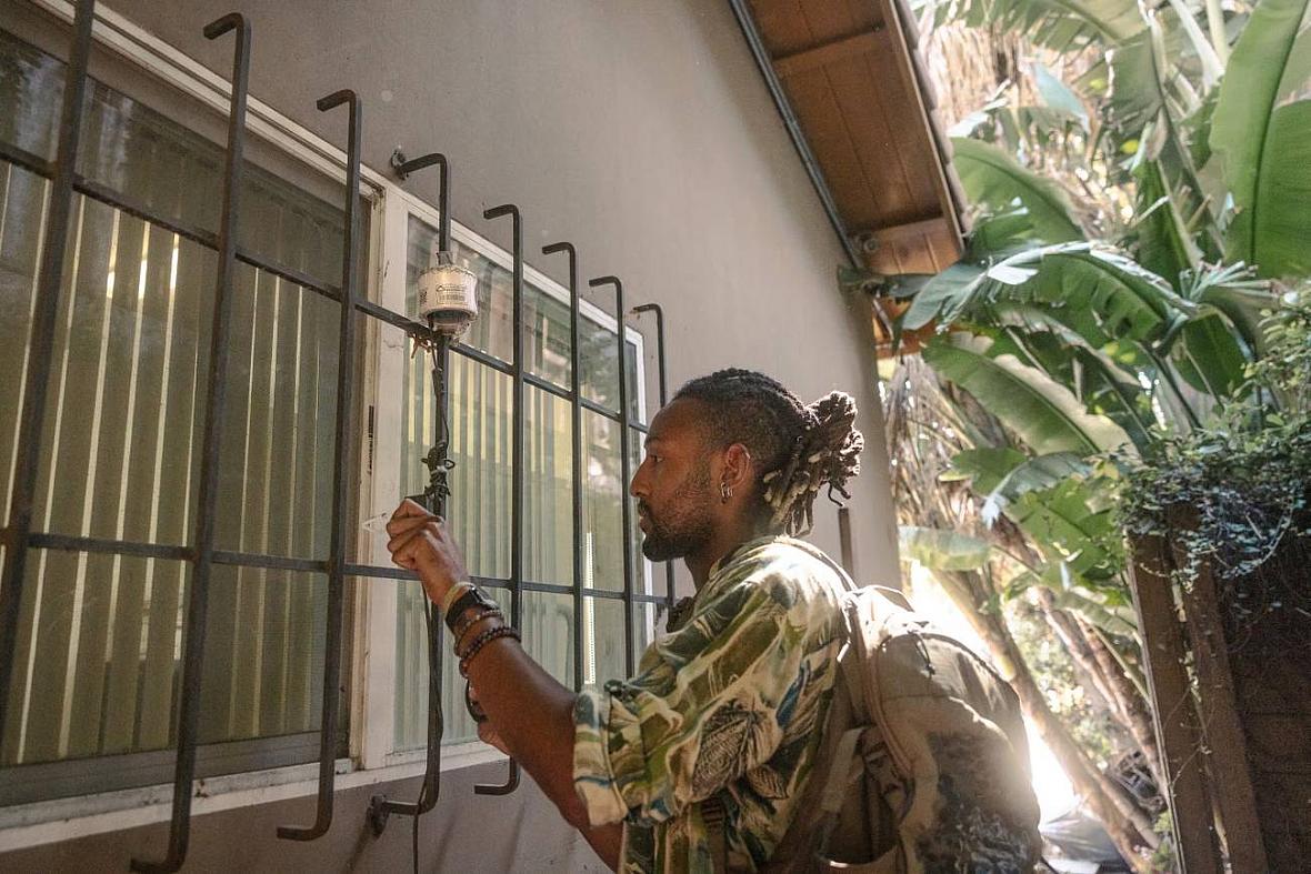 A men standing by a window
