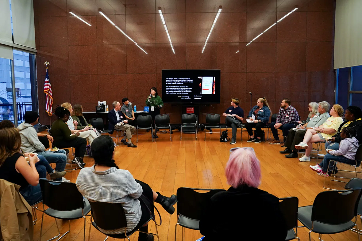 Group of people seated in a circle