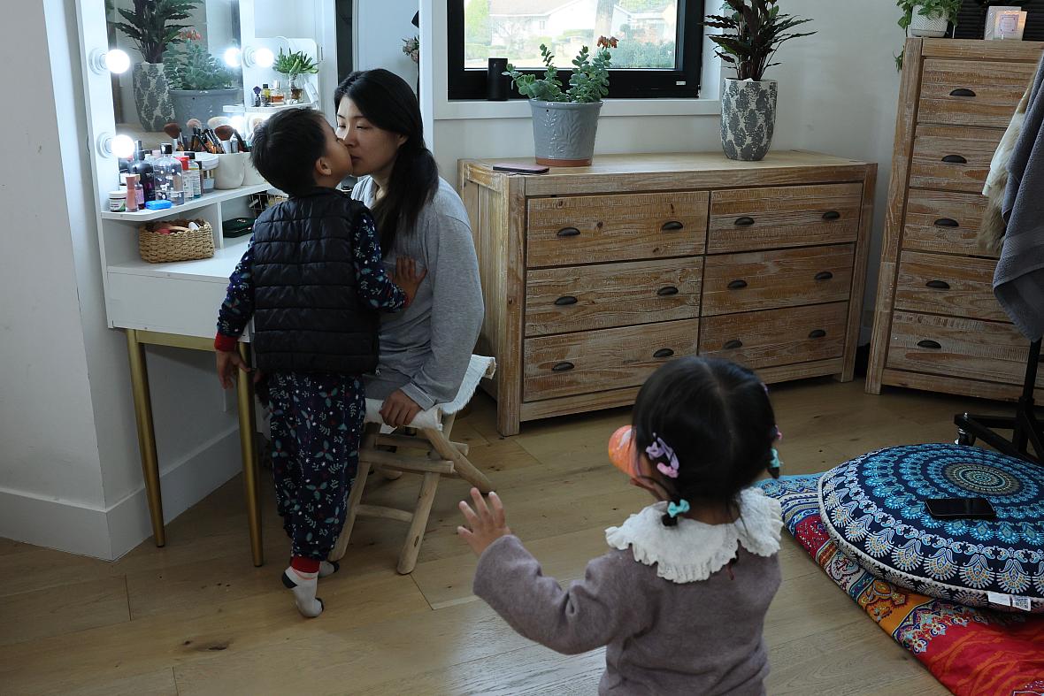 Comedian, actress and postpartum depression survivor Jiaoying Summers with her 4-year-old son and 2-year-old daughter in their home 