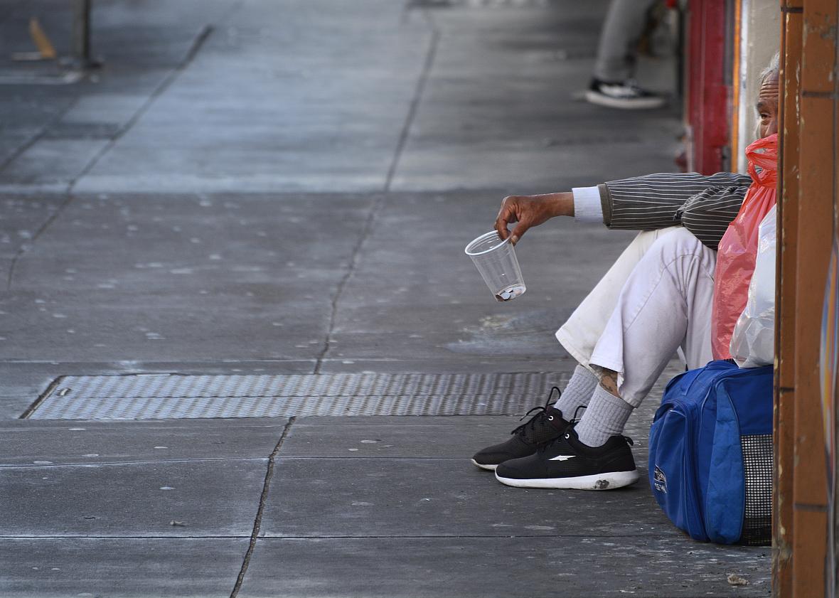 A man on a sidewalk