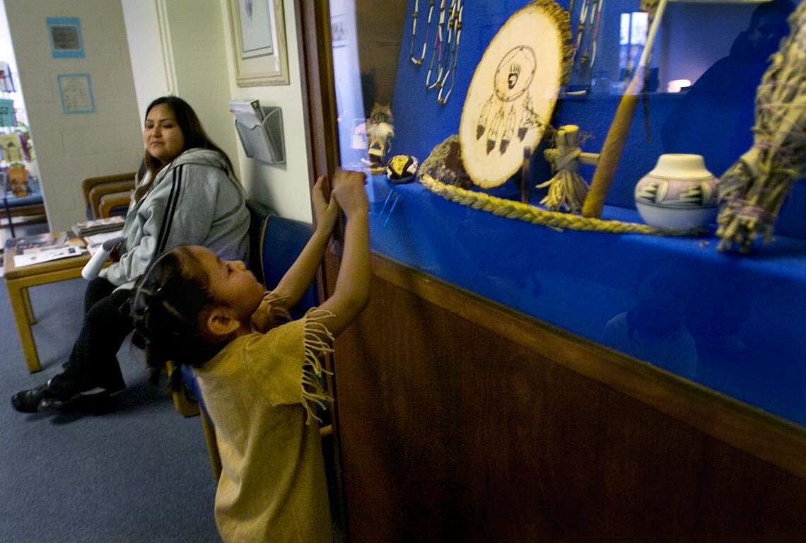 Child looking up at souvenir