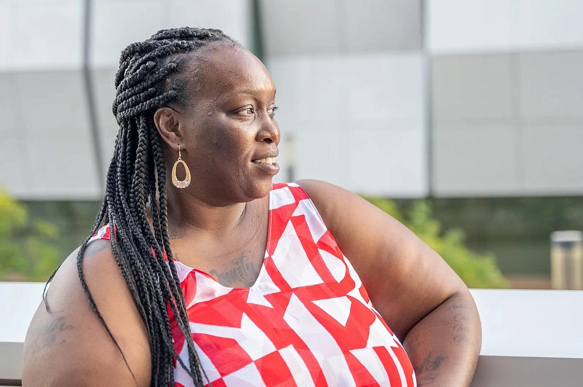 woman in a red and white blouse
