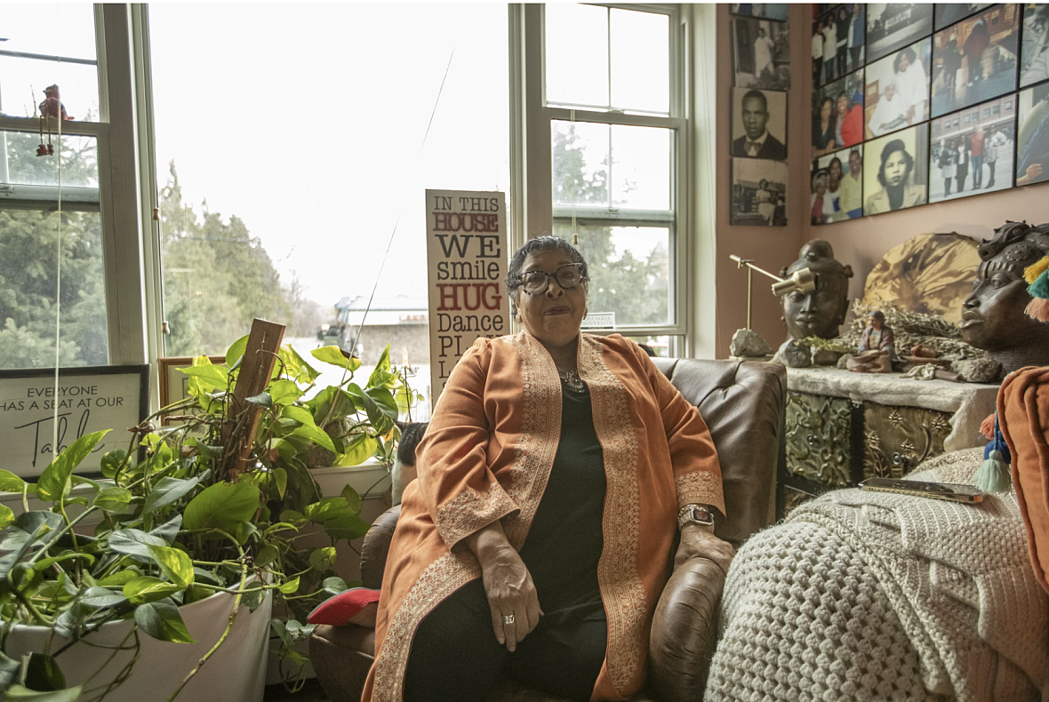 Person sitting on an armchair