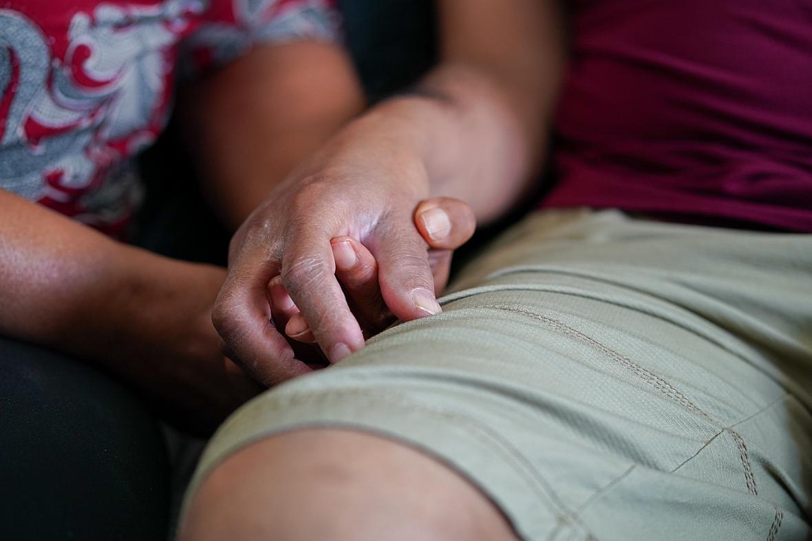 Hands intertwined