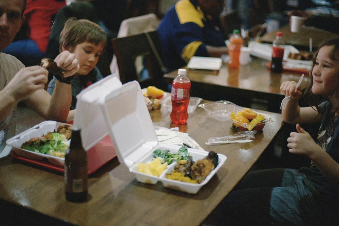 Kids eating lunch at school.
