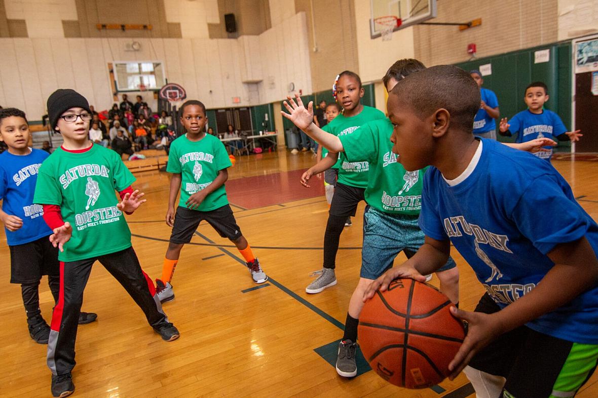 Image of children playing basketball