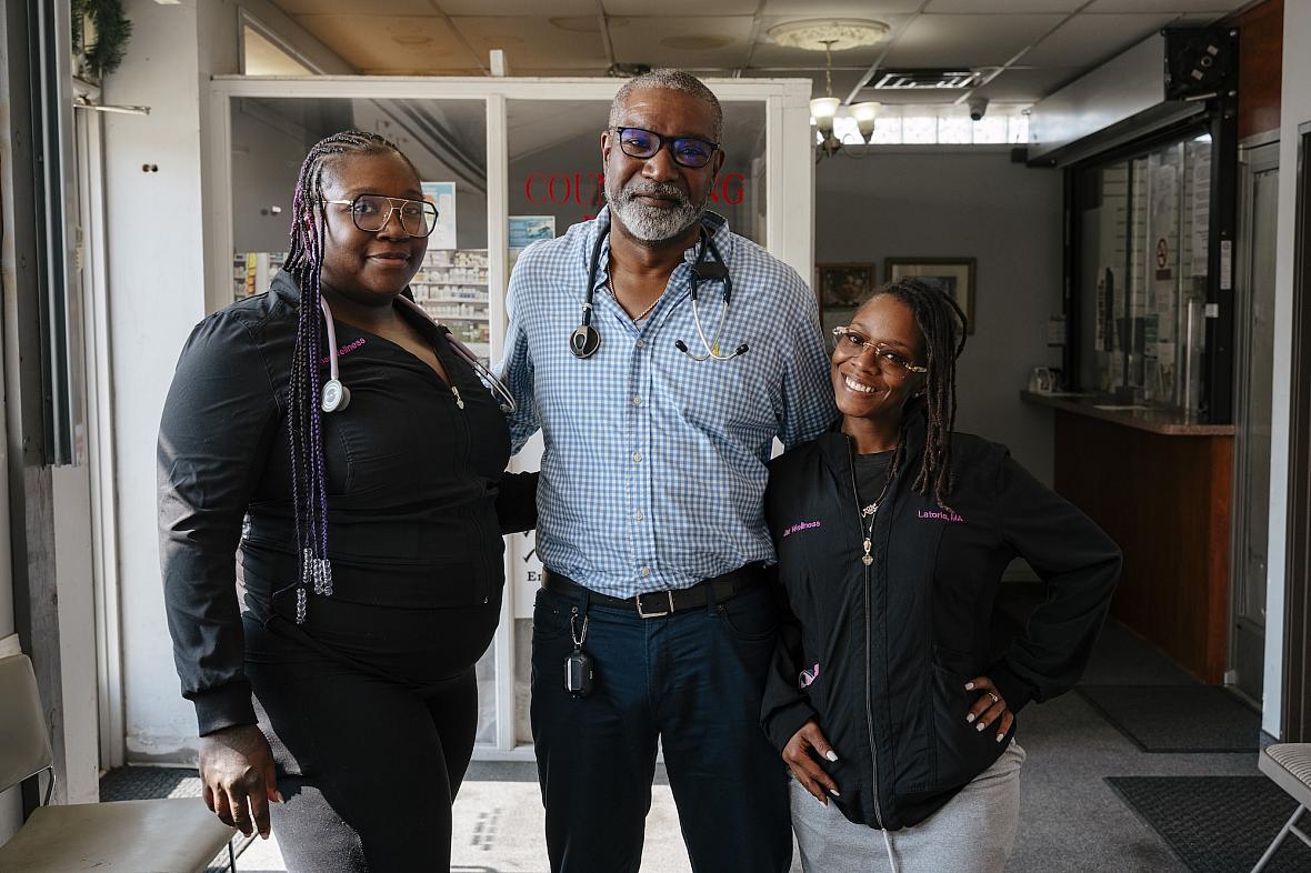 Three people standing together