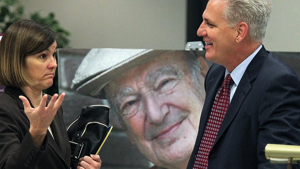 Rep. Kevin McCarthy (R-Bakersfield) talks with Lisa Higgins, associate director of Valley Fever Initiatives at The University of Arizona, during a Valley Fever Symposium in Bakersfield. (Photo: Casey Christie / The Californian)