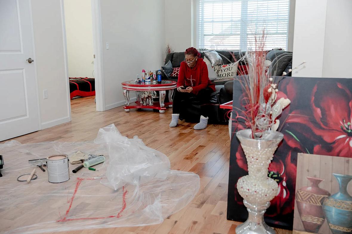 Person preparing to paint walls