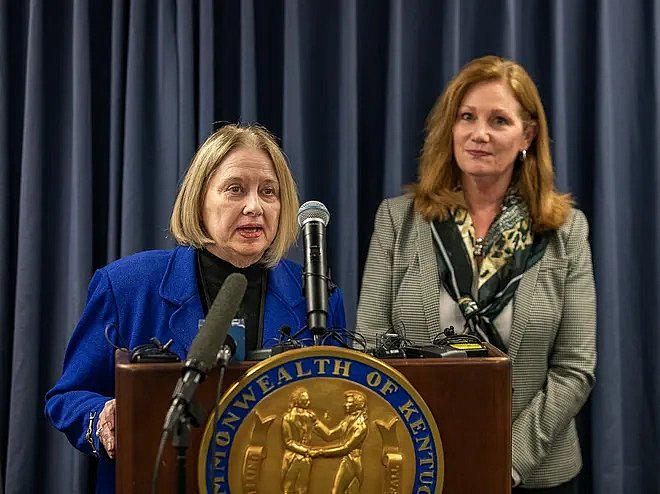 Two women speaking in a press conference