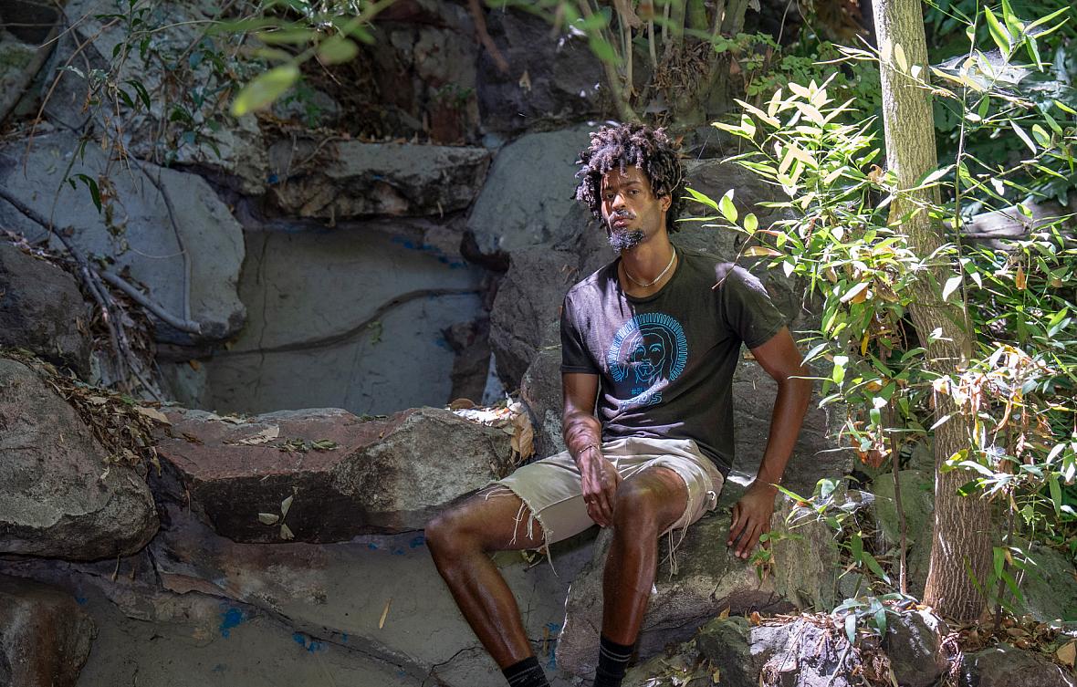 Person sitting on rocks