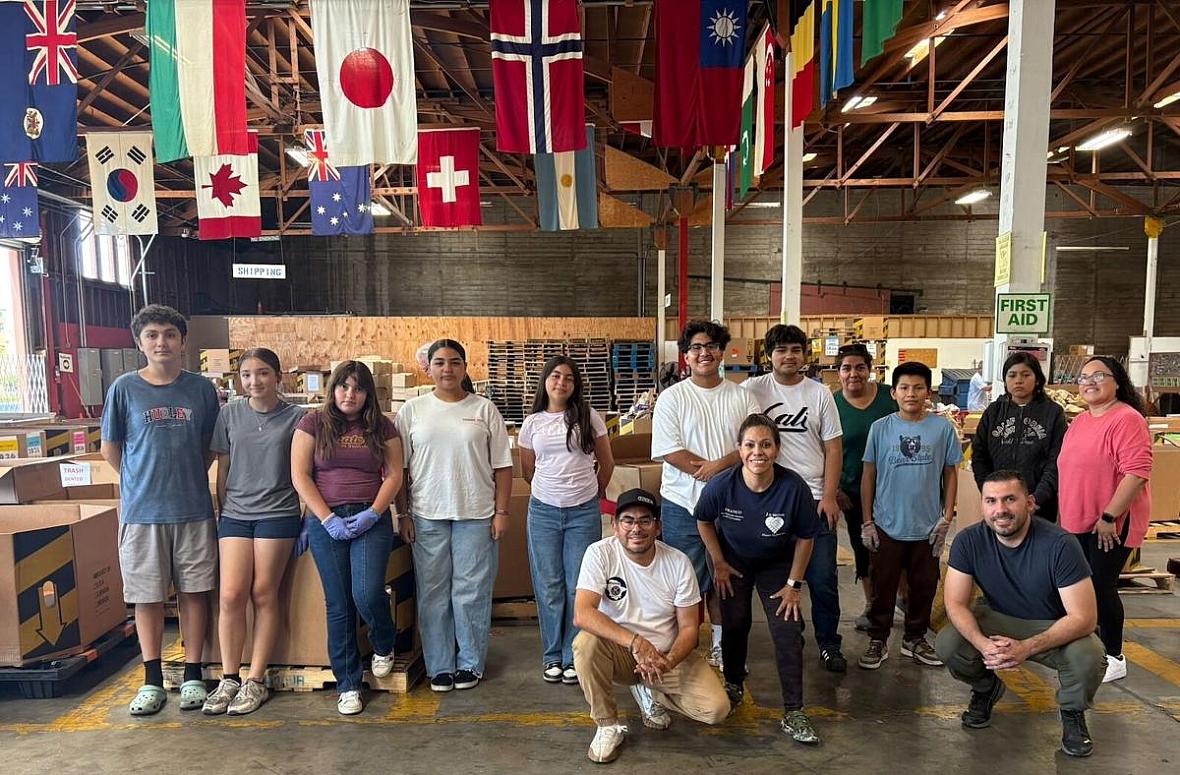 Group photo under multiple flags
