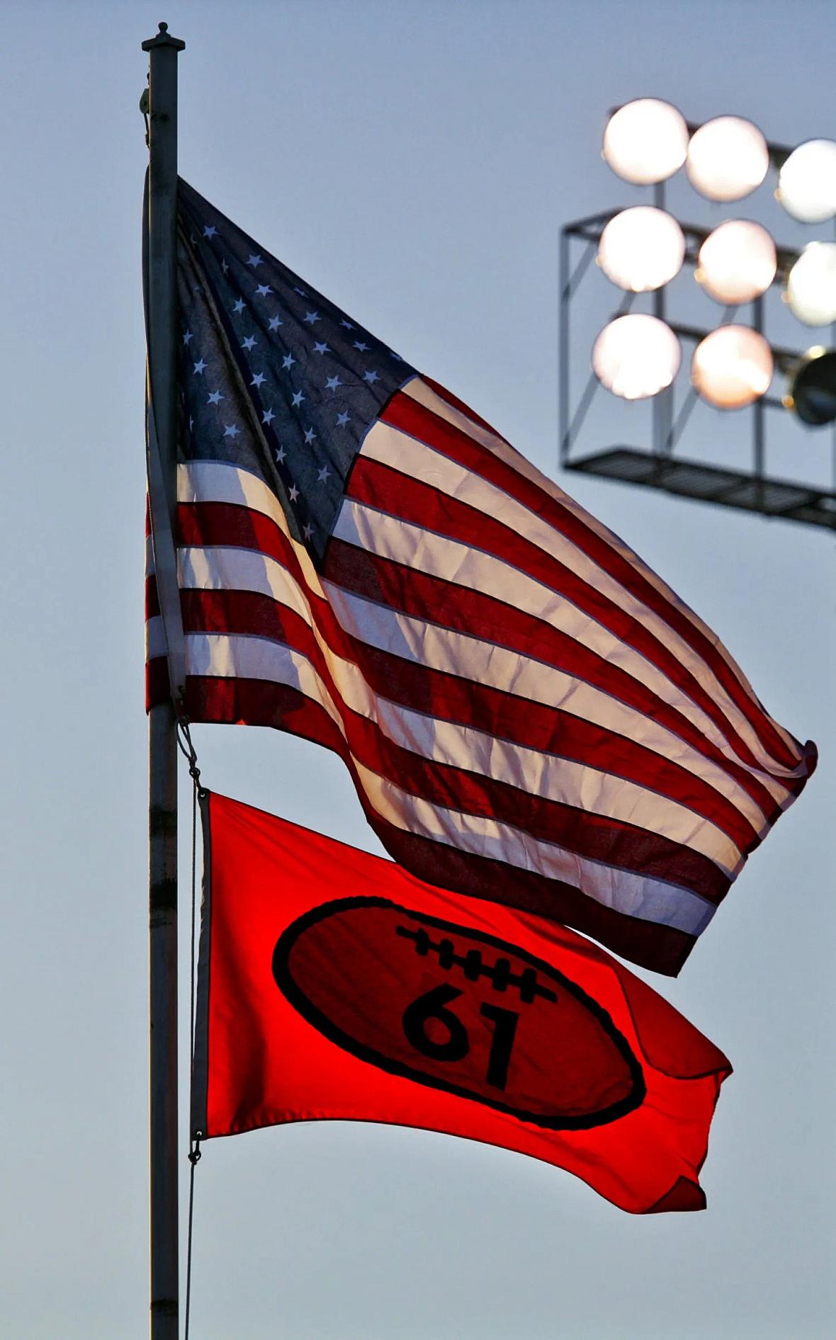 Flag of America and school's football flag