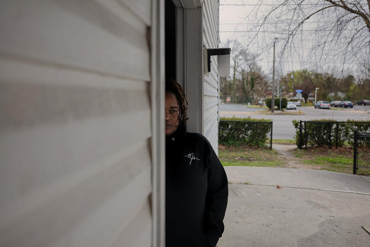 person standing in a doorway