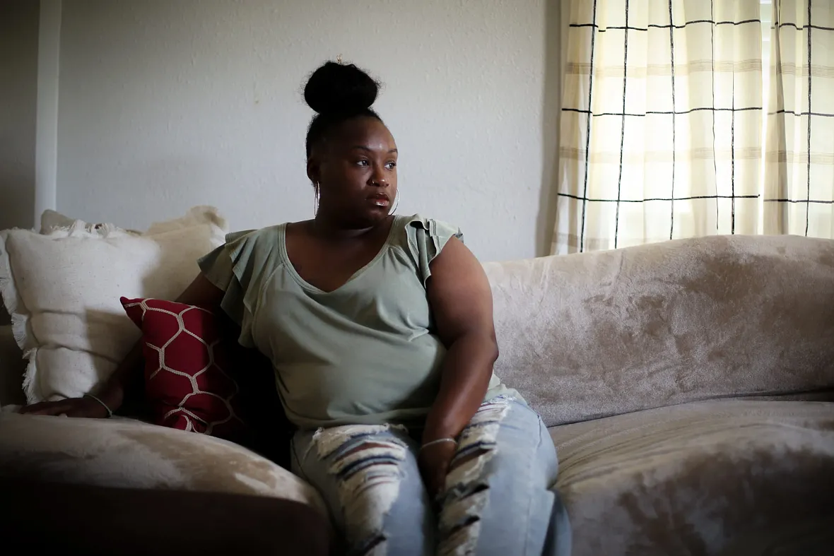 Person sitting on couch
