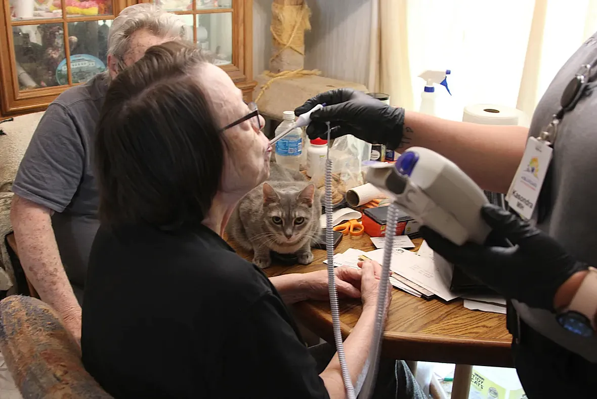 Paramedic taking temperature