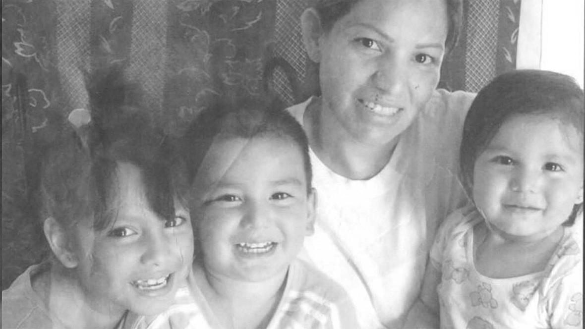 Old photograph of 4 people