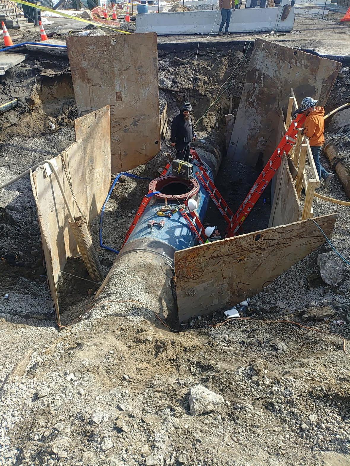 Repairs on a broken 54-inch water main in Southwest Detroit