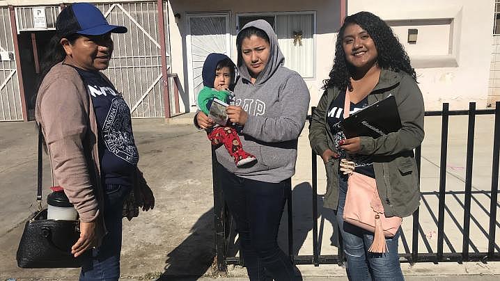 An image of MICOP Health Promoters, Rosita and Lidia on the streets of Oxnard of the Mixteca community