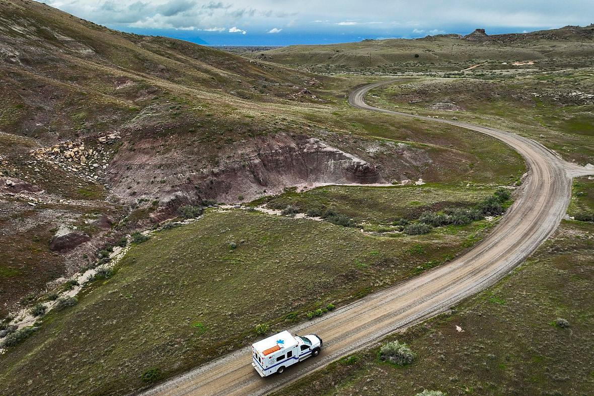 Image of an EMS driving down the rocky road