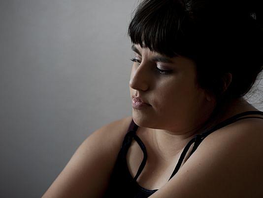 Michelle Rivera, 23, reflects on her past and success in the TAY Crossroads program. (Photo by Ron Holman/Visalia Times-Delta) Michelle Rivera, 23, reflects on her past and success in the TAY Crossroads program. (Photo by Ron Holman/Visalia Times-Delta)