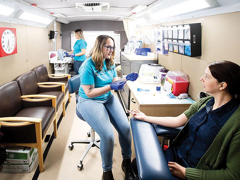 UCSF’s mobile DeLiver van brings rapid testing, blood draws, and even liver fibroscans to people living on the streets, in their