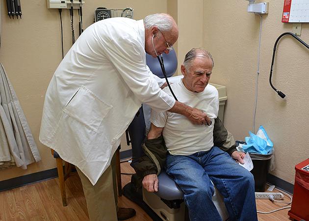 Charles Condelos, a retired banker, regularly goes to the Santa Barbara Neighborhood Clinics for his primary care and to renew his prescription for back pain medication. He says Dr. Charles Fenzi, who was treating him that day at the Westside Clinic, and Dr. Susan Lawton are some of the best people he’s ever met. (Giana Magnoli / Noozhawk photo)