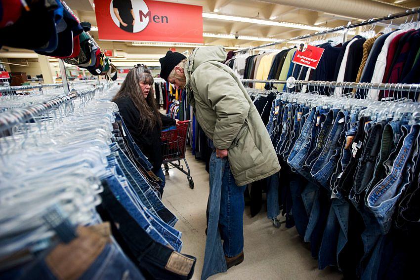 Debbie Flowerdew, case manager with Pathways program of Anchorage Community Mental Health Services, shops with Scott Brown at Value Village to prepare him to travel to a residential treatment program in Sitka. Flowerdew said there’s a lack of residential treatment options for alcoholics who are trying to get off the street. Brown, who had been living homeless in Anchorage, said he wants to try to make some changes. “I’ve felt trapped for quite a while,” he said.