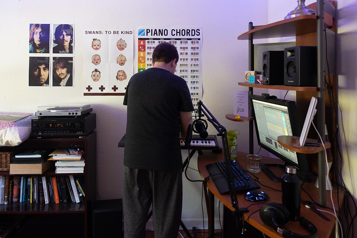 Brian plays on his electric keyboard while working on a song in his music studio in his Palo Alto home on Aug. 22, 2022. Brian plays on his electric keyboard while working on a song in his music studio in his Palo Alto home on Aug. 22, 2022.