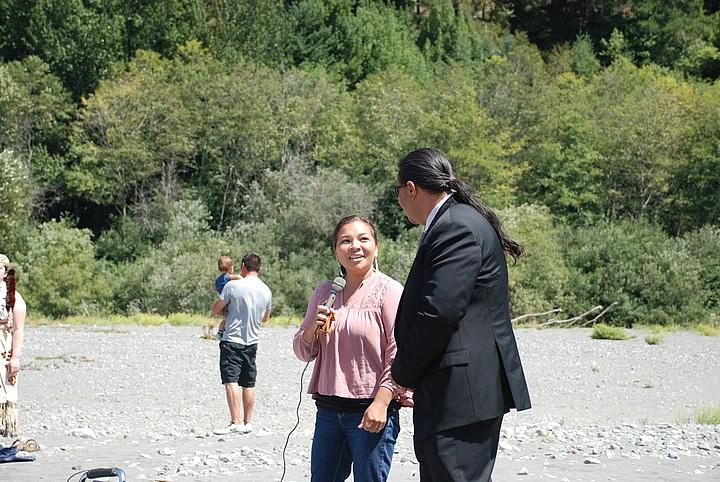 Victoria Carlson and Javier Kinney sing a Brush Dance song during a celebration at the mouth of Blue Creek on Monday.