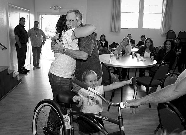 Casa Serena executive director Craig Belknap gets a hug from a grateful Santa Barbara County Sheriff’s Treatment Program graduat