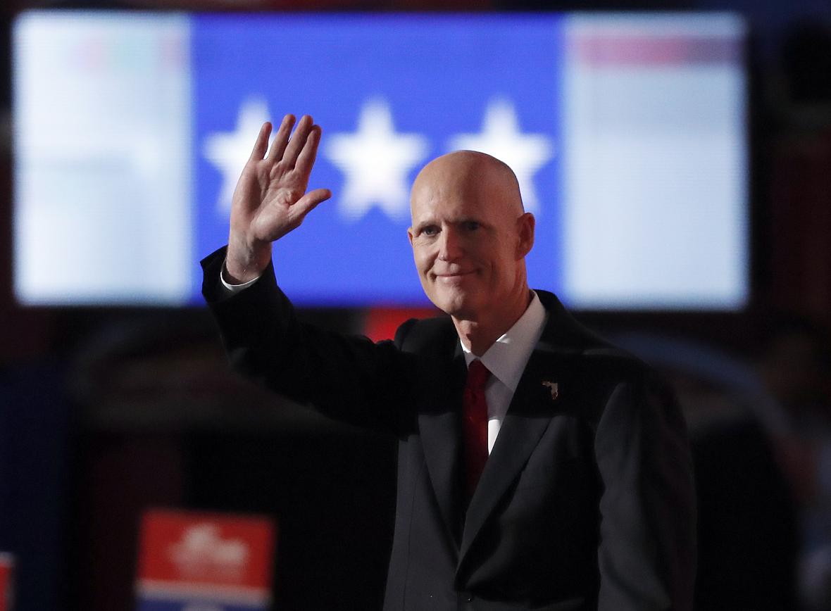 Florida Gov. Rick Scott speaks during the third day of the Republican National Convention in Cleveland, Wednesday, July 20, 2016. (AP Photo/Paul Sancya) Florida Gov. Rick Scott speaks during the third day of the Republican National Convention in Cleveland, Wednesday, July 20, 2016