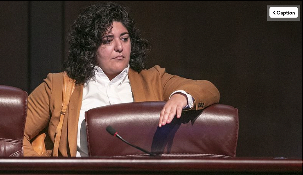 Council member Liliana Bakhtiari prepares to take her seat on the dais as the Atlanta City Council held their first in person meeting since they were suspended at start of the pandemic In Atlanta on Monday, March 21, 2022. Council member Liliana Bakhtiari prepares to take her seat on the dais as the Atlanta City Council held their first in person me