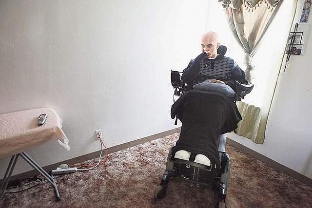 Joel Aguilar, shown April 14 in his Salinas home, reflects about the night he was shot. Aguilar is paralyzed from the waist down
