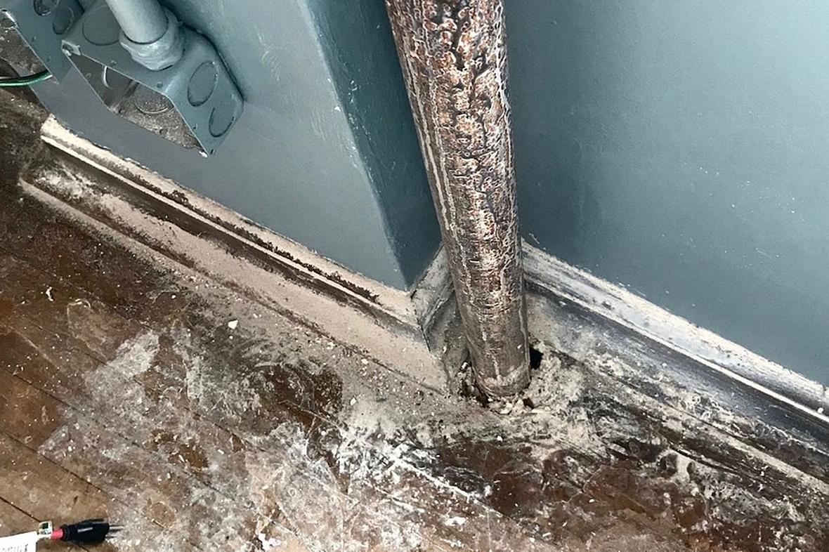 Paid contractors at J.H. Brown Elementary said asbestos was safely removed from this classroom this summer. This photo was taken a day later. The debris contained asbestos, tests revealed. Paid contractors at J.H. Brown Elementary said asbestos was safely removed from this classroom this summer. This photo was taken