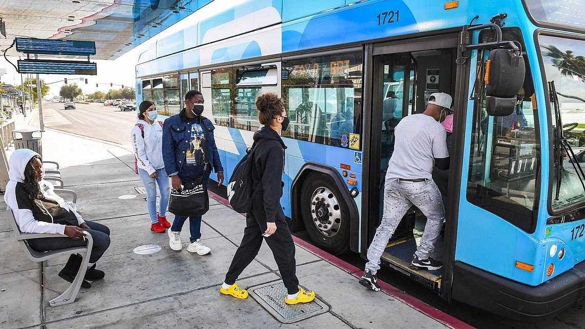 Passengers board a FAX bus at a stop near Manchester Center in Fresno. In Fresno County, about 65% of all jobs are within a 10-m
