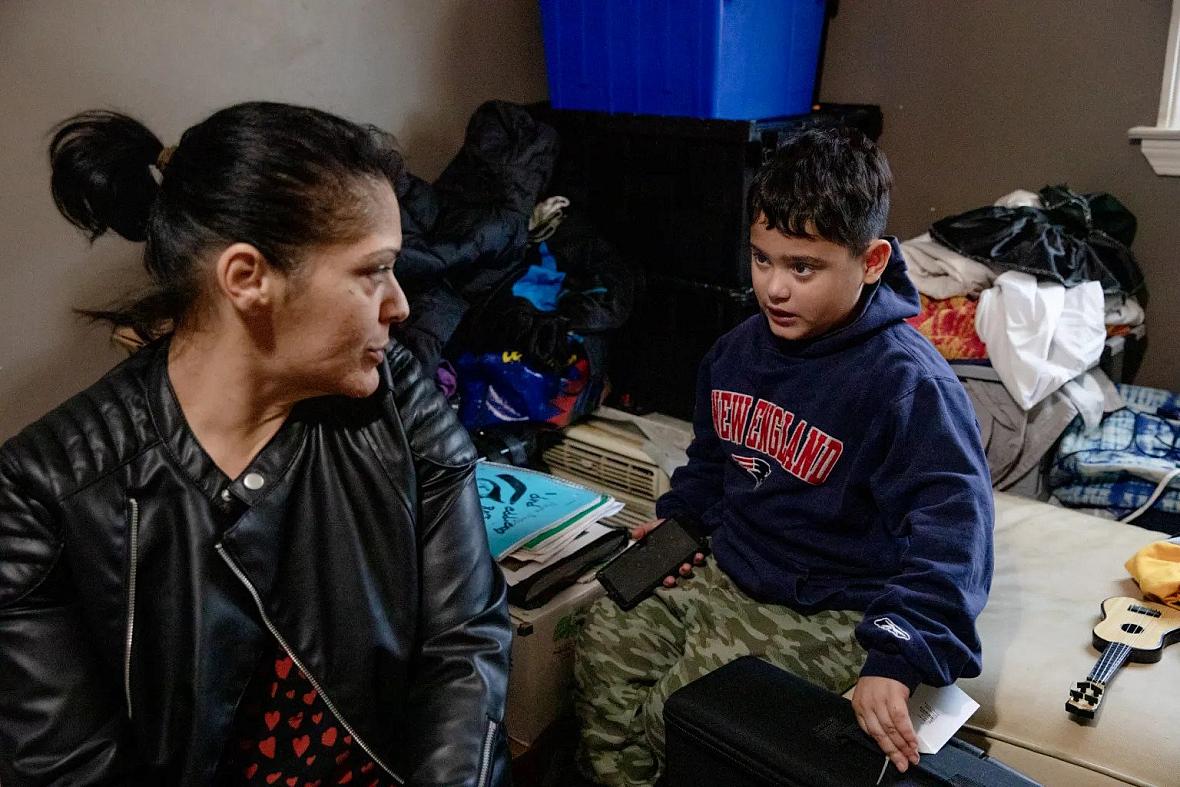 Elizabeth Rodriguez, her son, Mikey Rodriguez, 8, and teenage daughter temporarily stay at her sister’s place after being evicted in June. Rodriguez said Mikey is scared, often asks her when they can go back home and cries at night. YEHYUN KIM / CT MIRROR Elizabeth Rodriguez, her son, Mikey Rodriguez, 8, and teenage daughter temporarily stay at her sister’s place after being evicte