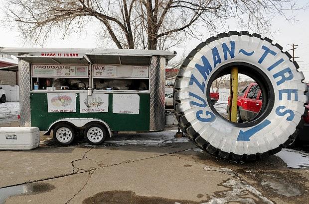 A loncheria cart in the parking lot of a tire store in Globeville. Credit: Stephen Swofford