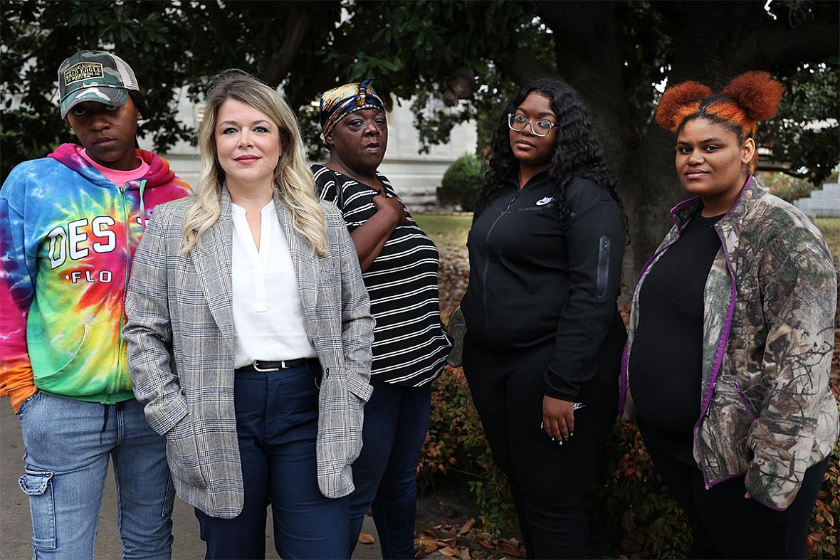 Bratika Green, Jordan Hughes, Debra Peterson, Jessica Griffin and Kanesha Head stand outside the Leflore County Courthouse in Gr