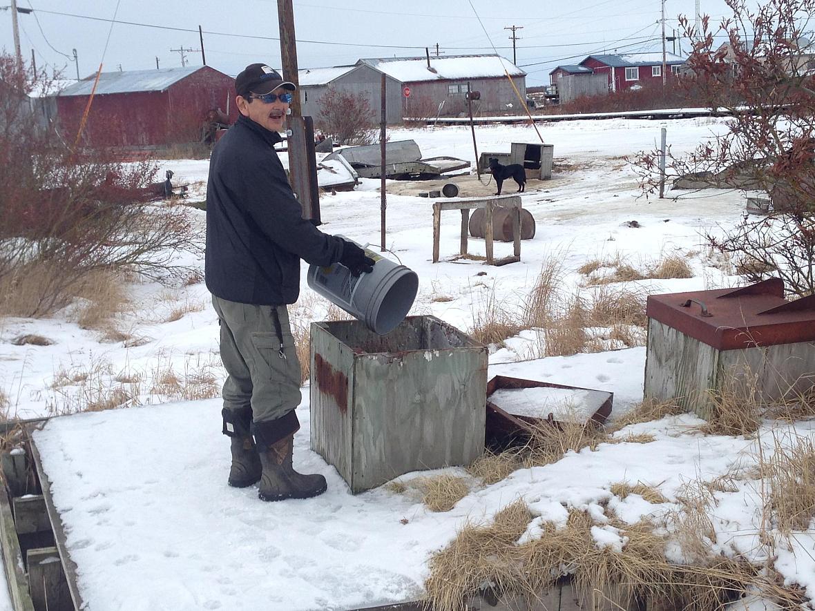 Adolf Lupie of Tuntutuliak laughed as he advised caution, “Make sure it’s not slippery around here or we’ll slip and the honey bucket will be over us.”