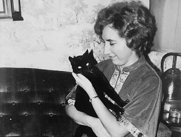 Colleen Loughman with one of her two cats, when she was a student in the 1950s at Holy Names University in Oakland. Loughman die