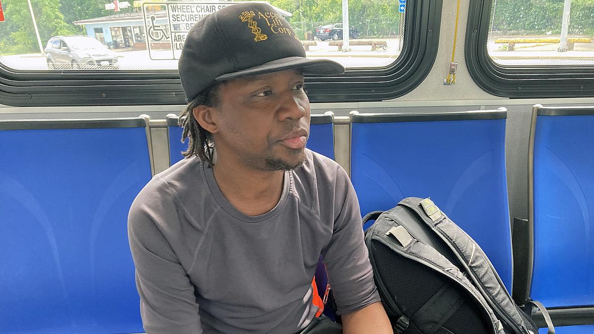 Mack Blackie rides a bus to the DMV to get a new ID card. | Lynn Arditi / The public's Radio Mack Blackie rides a bus to the DMV to get a new ID card. | Lynn Arditi / The public's Radio