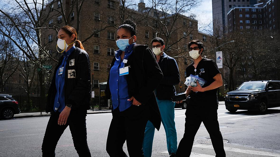 Medical workers outside of Mount Sinai Hospital in New York City. GETTY IMAGES