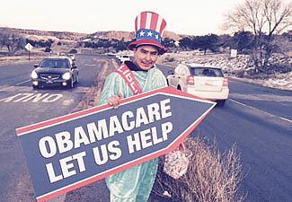 To drum up business, Liberty Tax Service in Tse Bonito, New Mexico is showing a creative outreach that's meant to reach commuters after work around nearby Gallup, New Mexico. Native tax filers will be able to file their Affordable Care Act (ACA) exemption with their tax filer. The exemption to ACA defers a shared cost penalty since American Indians and Alaska Natives are allowed to opt out of the federal insurance program if they choose. Photo by Sage Garland To drum up business, Liberty Tax Service in Tse Bonito, New Mexico is showing a creative outreach that's meant to reach commuters after work around nearby Gallup, New Mexico. Native tax filers will be able to file their Affordable Care Act (ACA) exemption with their tax filer. The exemption to ACA defers a shared cost penalty since American Indians and Alaska Natives are allowed to opt out of the federal insurance program if they choose. Photo by Sage Garland