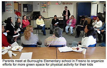 Parents meet at Burroughs Elementary School in Fresno to organize efforts for more green space for physical activity for their k