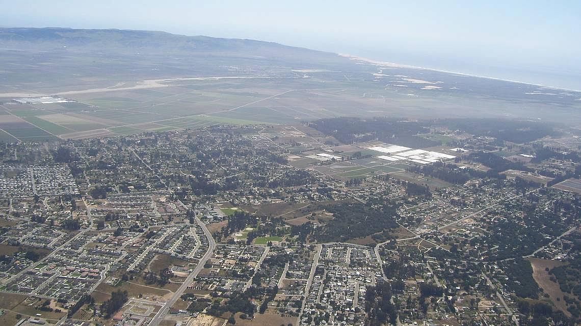 Aerial views of the Nipomo Mesa show a plume of dust that sweeps through the community on windy days.