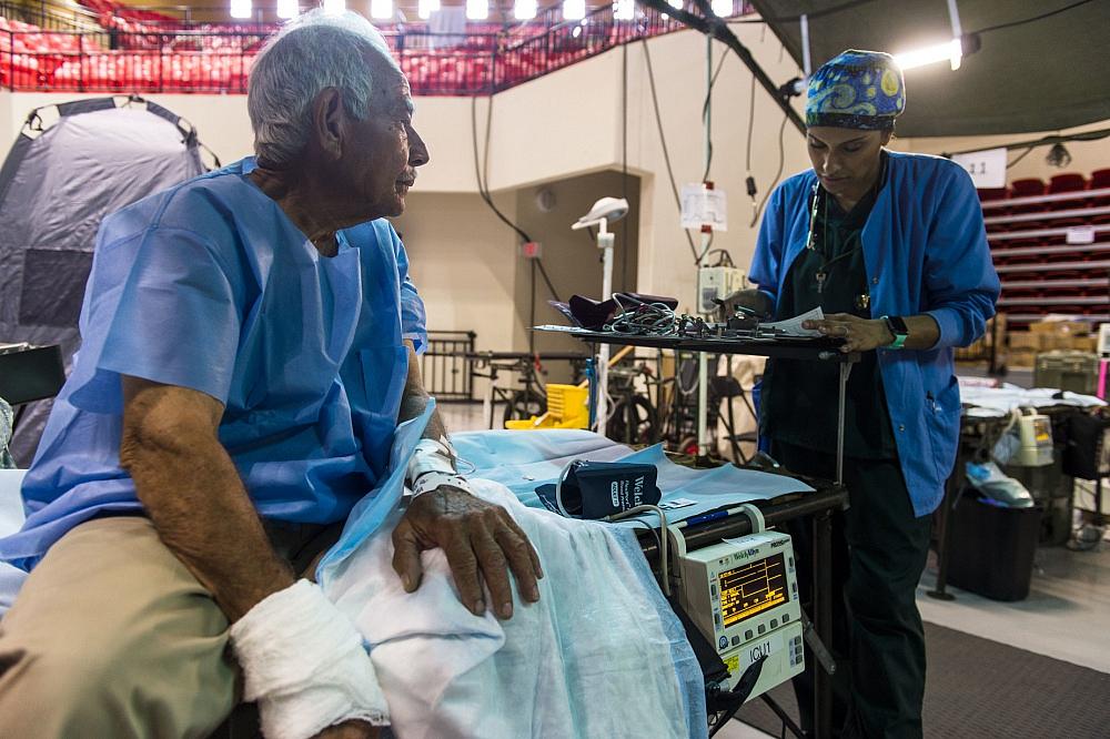 A local resident from Humacao, Puerto Rico, is prepared for hand surgery. A local resident from Humacao, Puerto Rico, is prepared for hand surgery.