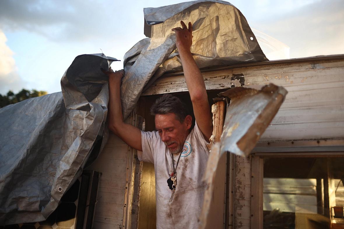 Robert Hernandez exits his trailer at an encampment on the baseball fields near Columbus Park in San Jose on Monday Monday, Sept. 19, 2022. Robert Hernandez exits his trailer at an encampment on the baseball fields near Columbus Park in San Jose on Monday Monday, Sept