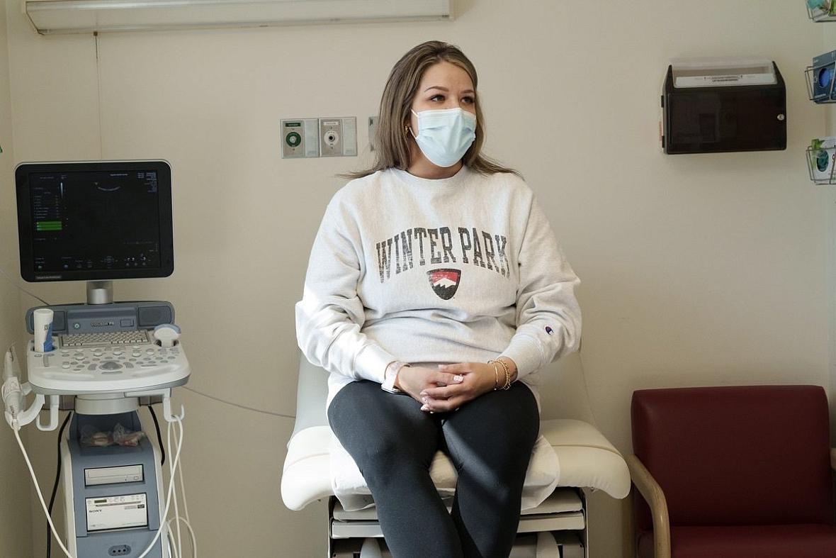 Patient Kaylen Mehlhaff meets with midwife Amanda Youngers for a regular checkup at an Indian Health Service facility in Rapid 