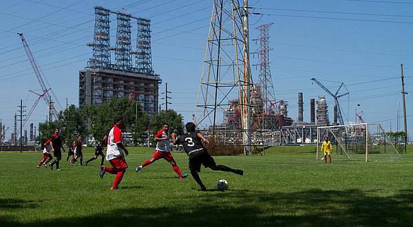 The tar sands facility being built at the BP Refinery in Whiting, Ind., formed the backdrop to a soccer game last month. The tar sands facility being built at the BP Refinery in Whiting, Ind., formed the backdrop to a soccer game last month.